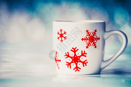 杯子与雪花冬天的背景,正视图咖啡高清图片素材