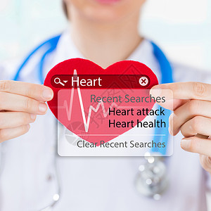 医生持心脏心跳符号与搜索引擎心脏病发作标志图片