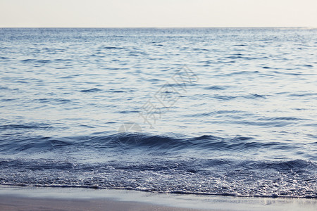 特写海浪特写海浪日落的光线下来海滩图片