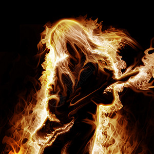 音乐家与电子吉他笼罩火焰黑色背景图片