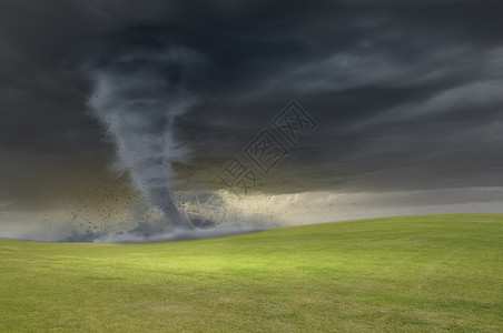 草地上的龙卷风强大的巨大龙卷风草地上扭曲的图像图片