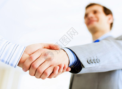 商务握手会议上商务握手的形象伙伴关系图片