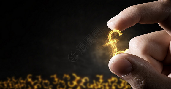 手指的金钱象征微小的英镑货币标志保持手指图片