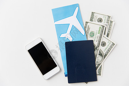 旅游,旅游物品机票,钱,智能手机护照桌子上图片