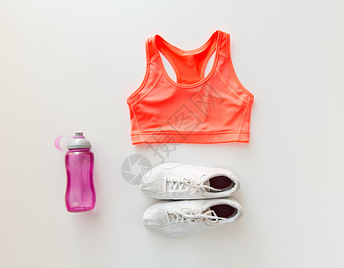 运动,健身,健康的生活方式物品的女运动服装瓶子图片
