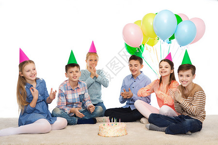 童,假期,友谊人的快乐的微笑孩子戴着生日蛋糕气球的派帽图片