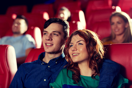 电影,娱乐活动人们的快乐的朋友剧院看电影观众高清图片素材