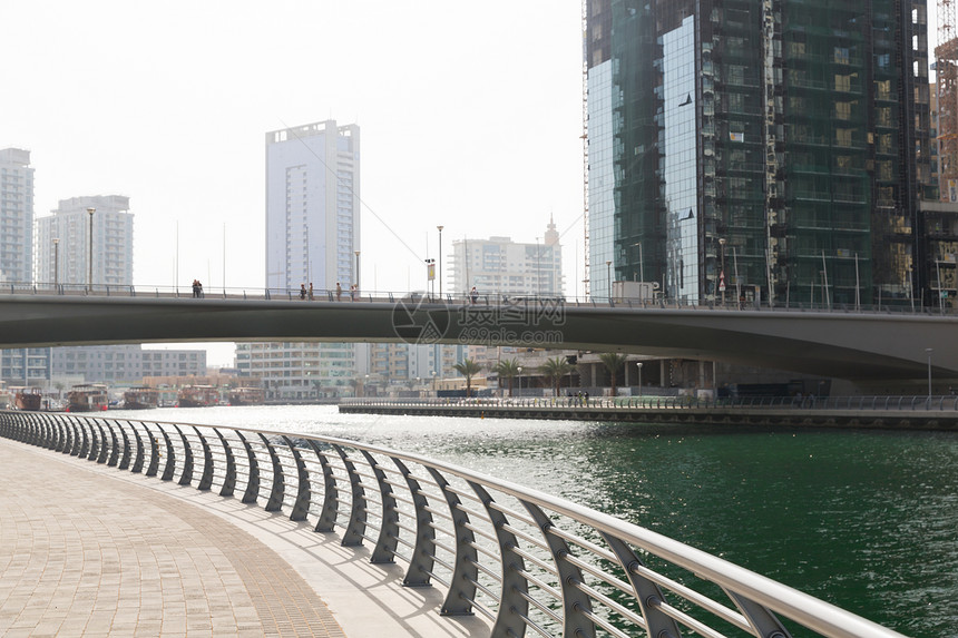 城市景观,旅游,旅游城市迪拜城市商业区与摩天大楼海滨桥梁图片