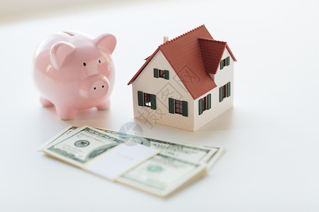 抵押贷款,投资,房地产财产家庭房屋模型,美元货币储蓄罐住房高清图片素材