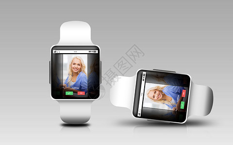 反应敏捷的现代技术,通信,象,响应媒体智能手表与来电屏幕灰色背景背景
