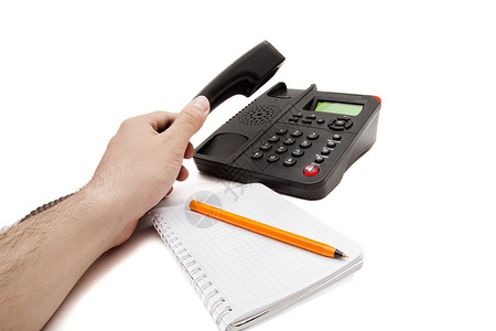 白色背景上的黑色IP电话笔记本钢笔背景