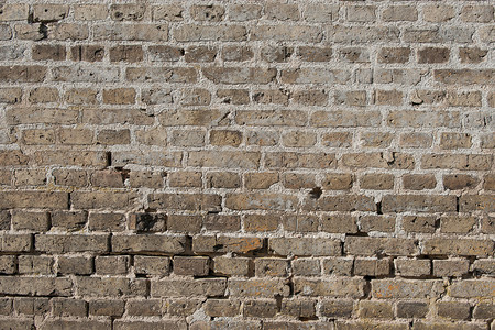 深色砖旧砖墙,磨损的石头深色背景