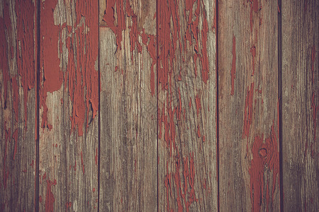 红色油漆剥落旧木板背景图片