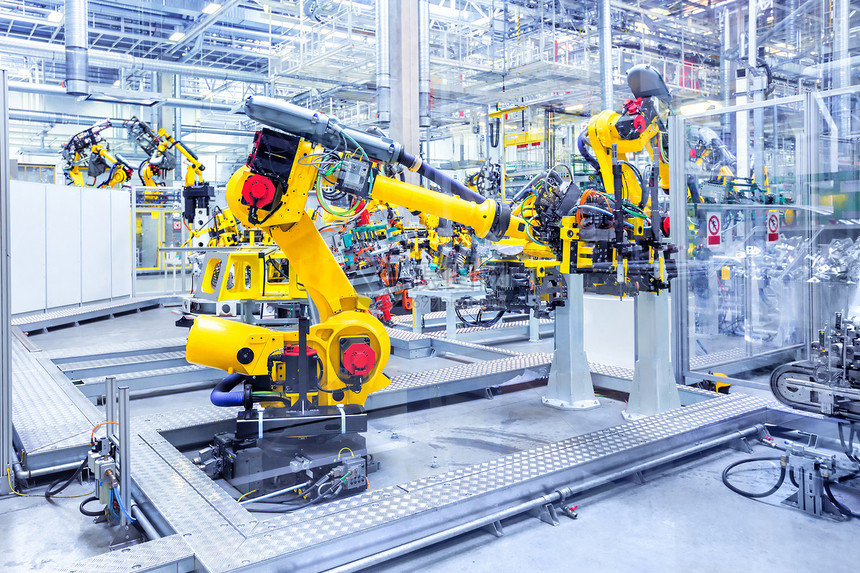 汽车厂的机器人汽车工厂的机器人手臂图片