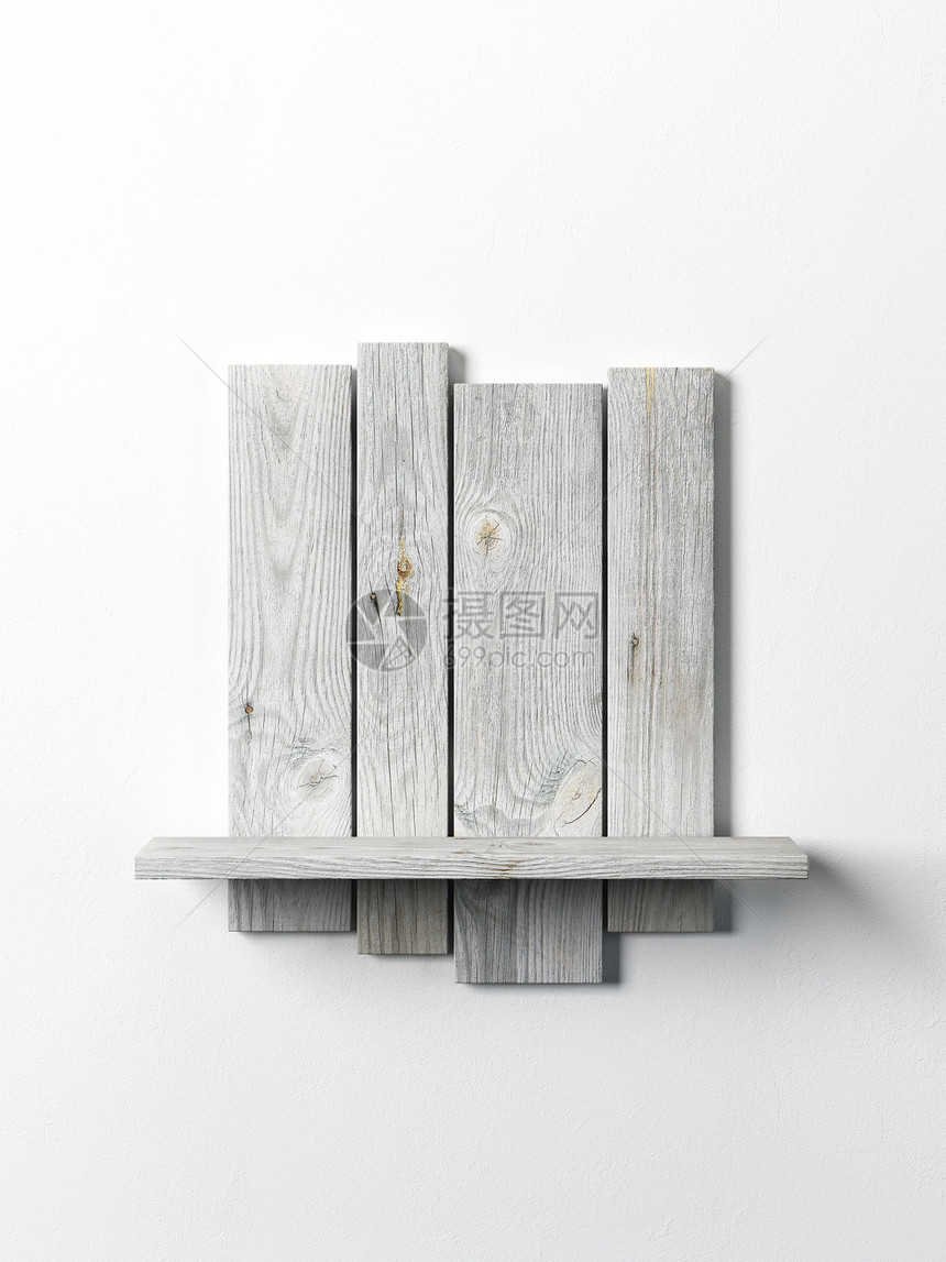 白色墙上的现代木制书架图片