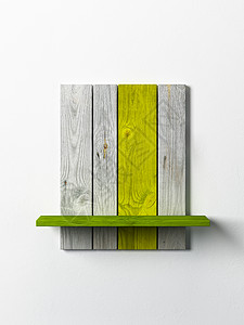 白色墙上的现代木制书架图片