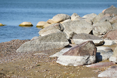 海边的堆大石头背景图片