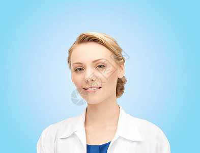 医学,人,职业医疗保健微笑的轻女医生穿着白色外套,蓝色背景图片