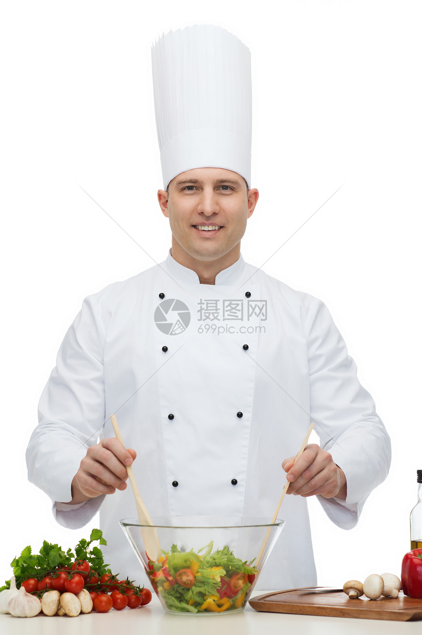 专业,素食,食物人的快乐的男厨师烹饪蔬菜沙拉图片