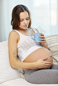 怀孕,饮料,休息,人期望的快乐的孕妇家里喝杯茶背景