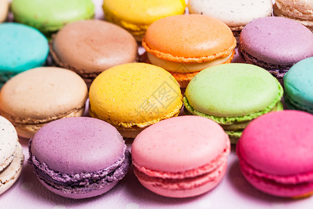 五颜六色的马卡龙法国甜点背景图片