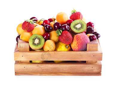 新鲜的各种水果白色背景的木箱里高清图片