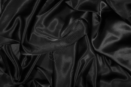 纹理的黑色缎子丝绸极端接近背景图片