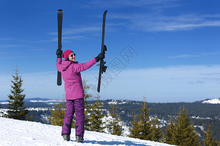 冬季妇女滑雪运动乐趣旅游雪图片