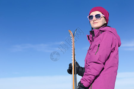 冬季妇女滑雪运动乐趣旅游雪图片