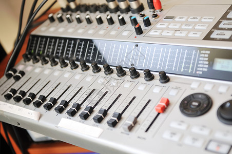 音量控制器按钮音乐工作室混音台特写背景