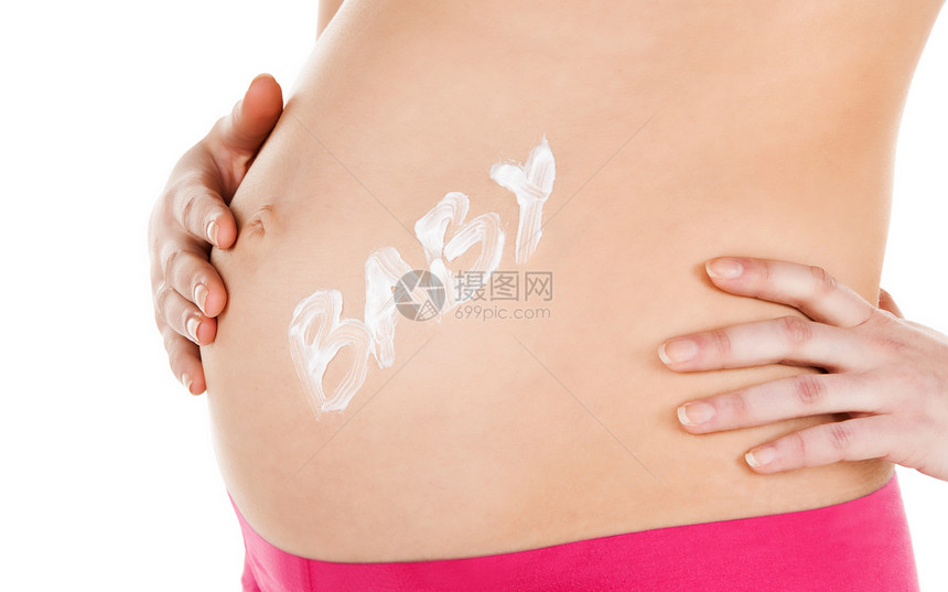 怀孕生育健康孕妇的腹部加奶油图片