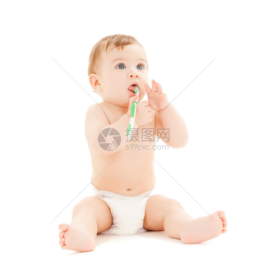 好奇宝宝刷牙的明亮图片图片