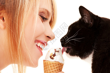逗猫女孩可爱的女孩带冰淇淋的猫的照片背景