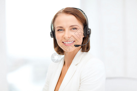 商业,沟通呼叫中心的微笑女帮助热线运营商与耳机呼叫中心图片