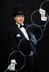 魔术,表演,马戏,表演魔术师顶的帽子技巧与链接戒指图片