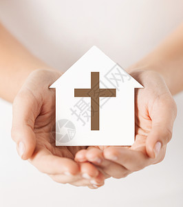 宗教,基督教慈善女手纸屋与基督教交叉符号耶稣高清图片素材