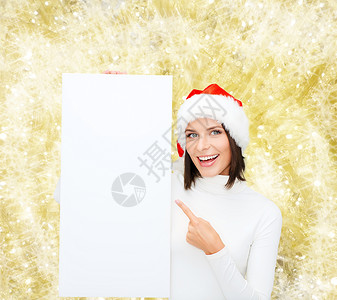 寒假,诞节,广告人们的微笑的轻女人戴着诞老人的帽子,白色的空白广告牌灯光背景上背景图片