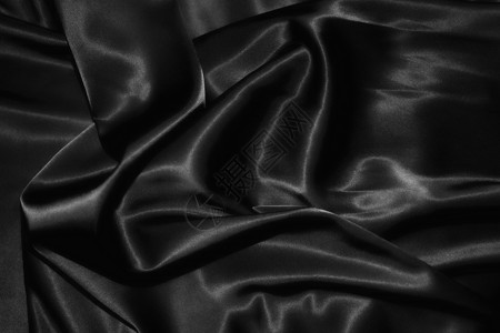 黑色丝绸的质地背景图片