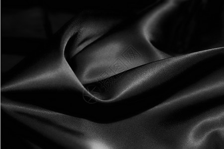 黑色丝绸的质地背景图片