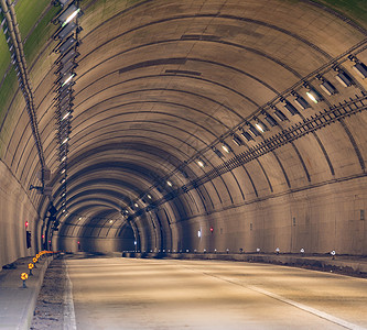 两车道公路隧道路背景图片