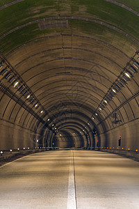 两车道公路隧道路背景图片