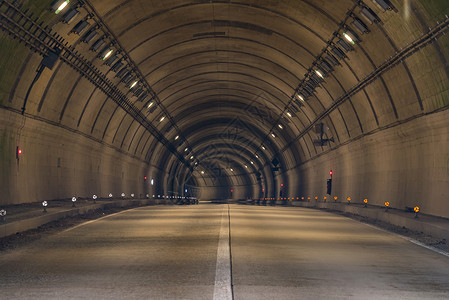 两车道公路隧道路背景图片