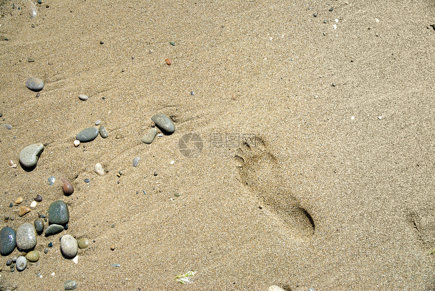 脚印的沙石图片