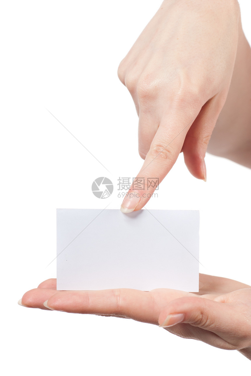 妇女的手着指着白色上隔离的空名片图片