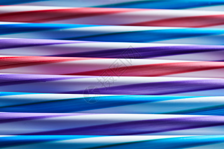 塑料饮用吸管的颜色图案创意背景顶部视图许多多色吸管中提取背景图片