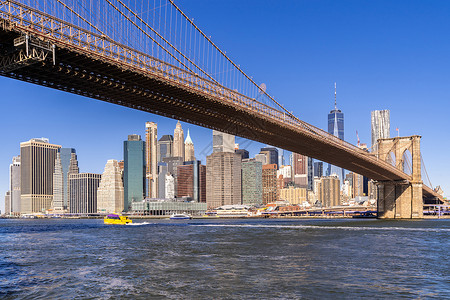 布鲁克林桥与曼哈顿下城摩天大楼布鲁克林纽约,纽约州,美国天际线高清图片素材