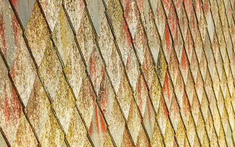 棕色石材瓦屋纹理建筑背景无缝图案,房屋细节特写石材屋顶图案背景图片