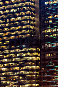 商务中心办公楼的城市抽象窗立,夜间反射颜色香港中国图片