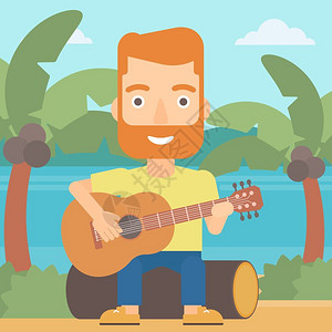 在热带海滩弹吉他的男人图片