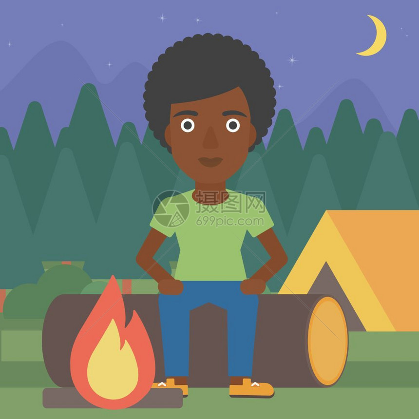 坐在露营地篝火旁的非裔女子图片